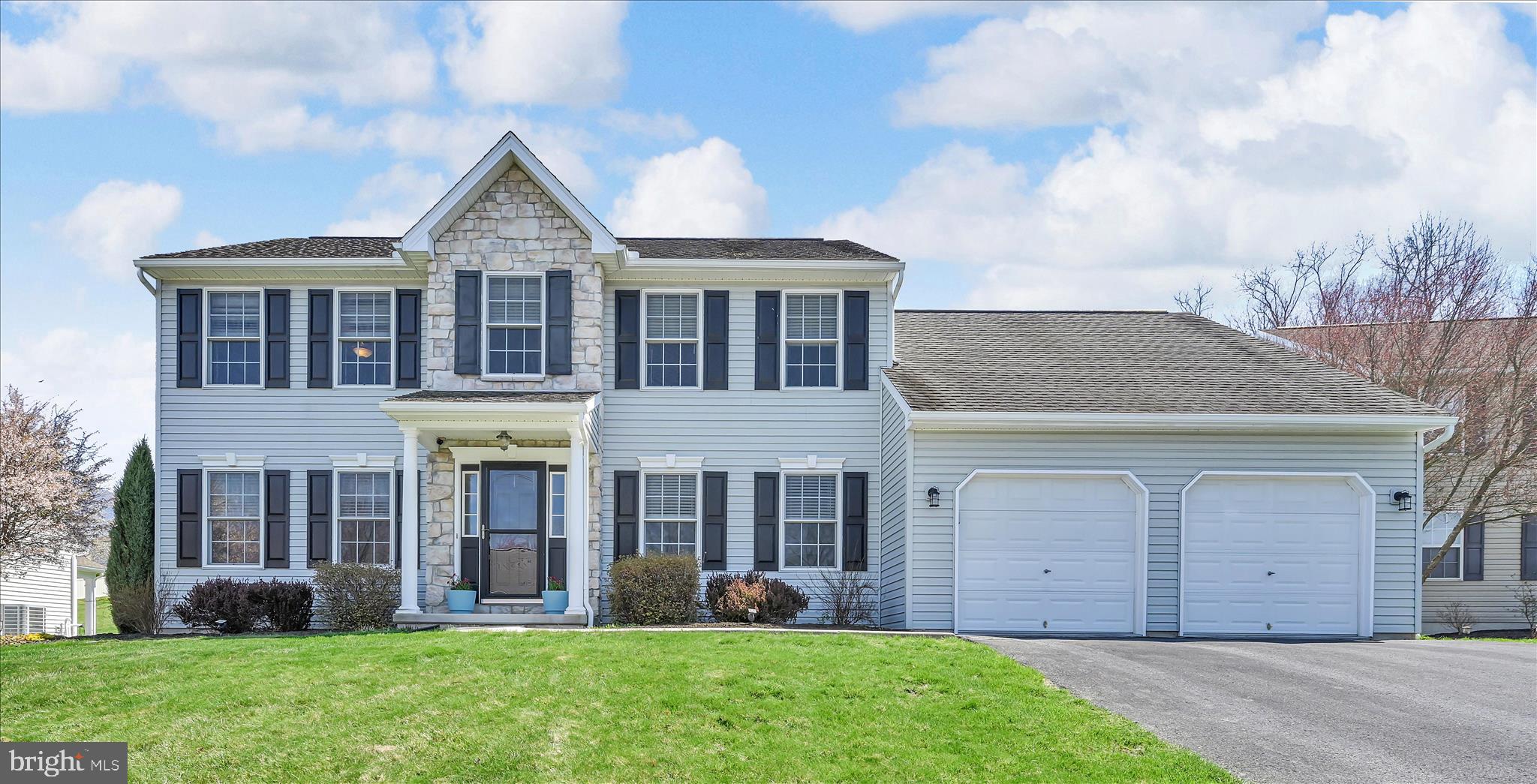 111 Holly Road Orwigsburg, PA 17961 - Photo 5 of 46 a front view of a house with garden