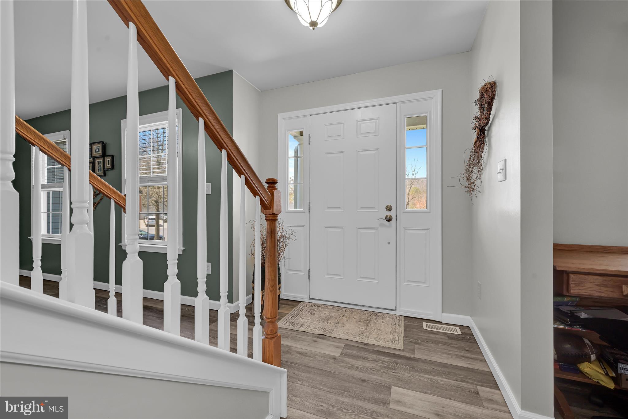111 Holly Road Orwigsburg, PA 17961 - Photo 10 of 46 a view of an entryway with staircase