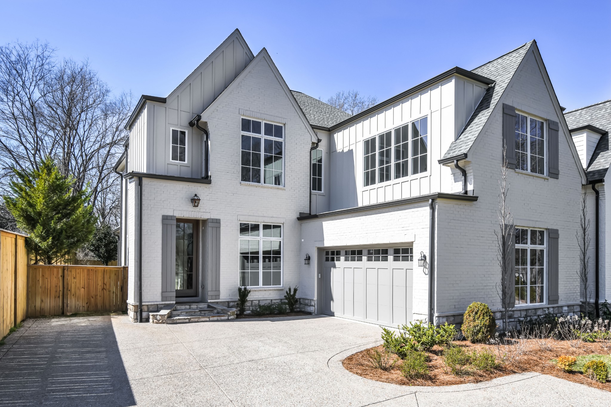 211B Page Road Nashville, TN 37205 - Photo 1 of 43 a front view of a house with yard