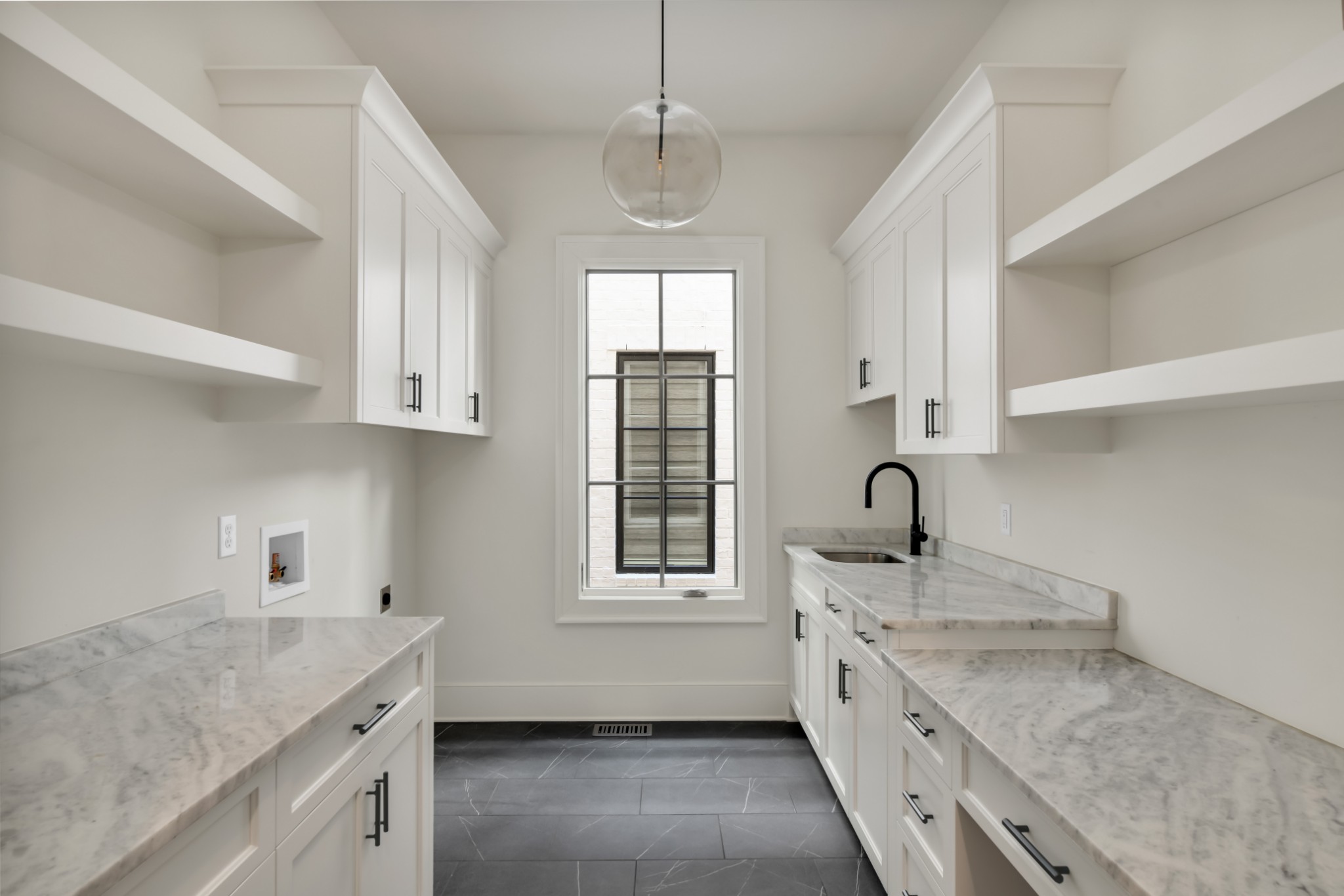 211B Page Road Nashville, TN 37205 - Photo 18 of 43 a kitchen with granite countertop a sink stove and cabinets
