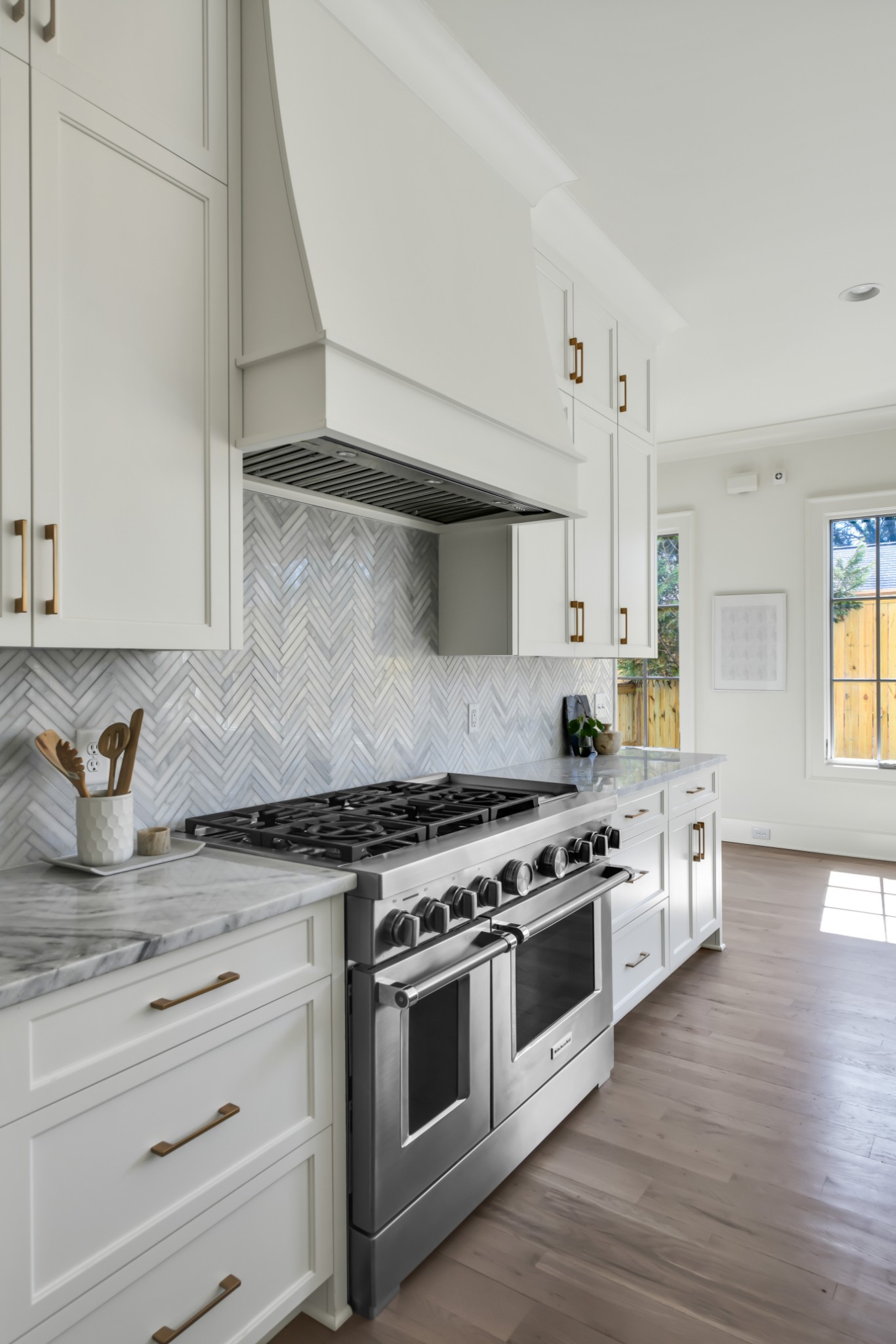 211B Page Road Nashville, TN 37205 - Photo 8 of 43 a kitchen with stainless steel appliances a stove and wooden floor