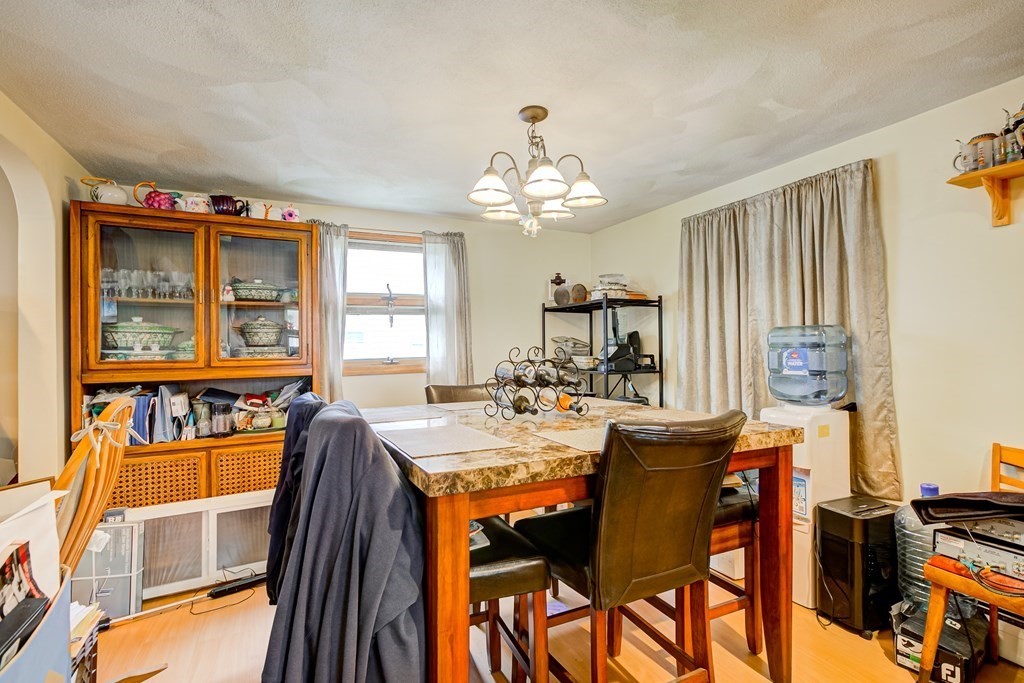 49 Bay Road Revere, MA 02151 - Photo 3 of 12 a view of a dining room with furniture window and outside view