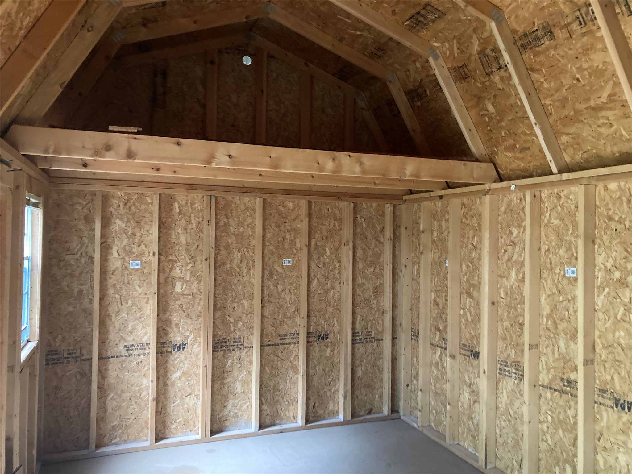 142 Walnut Ridge Livingston, TX 77351 - Photo 24 of 36 It features a vaulted ceiling and a small window on one side, offering potential for customization.