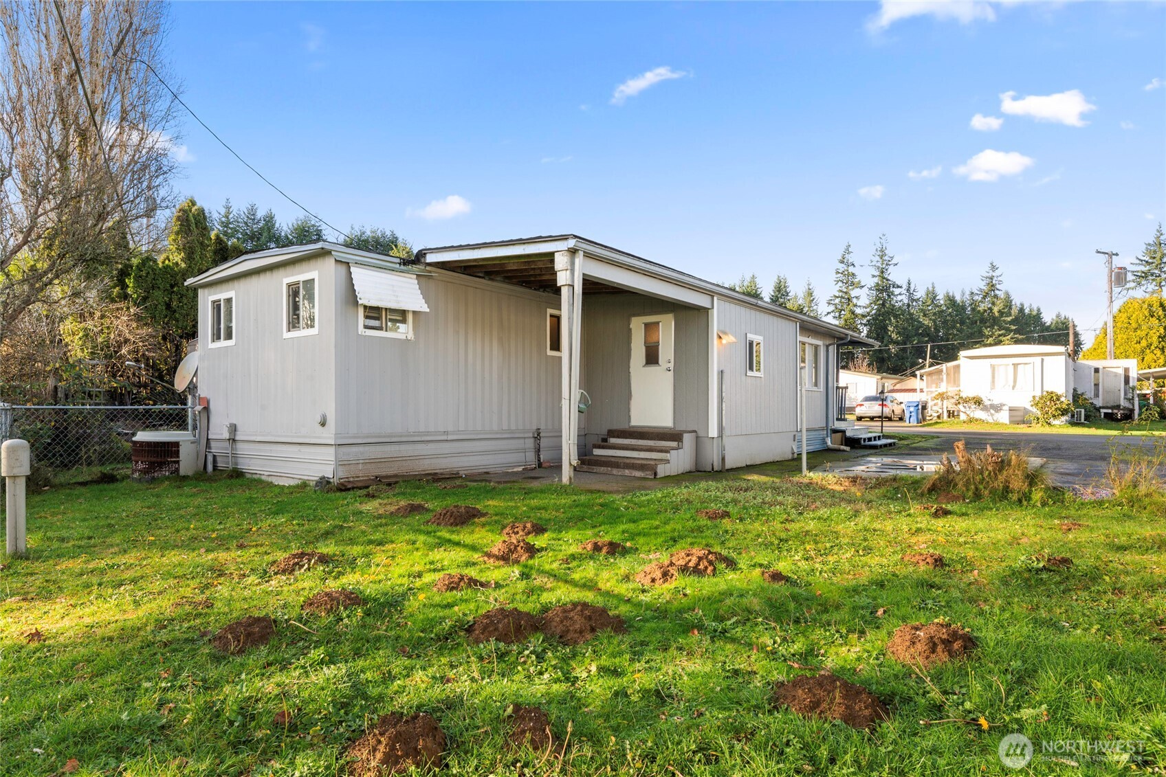 1617 Fones Road Southeast, Unit 47 Olympia, WA 98501 - Photo 13 of 15 a house view with a backyard space