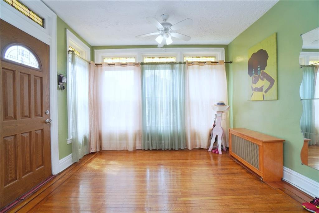 157 Sullivan Place Brooklyn, NY 11225 - Photo 12 of 28 a view of entryway with wooden floor