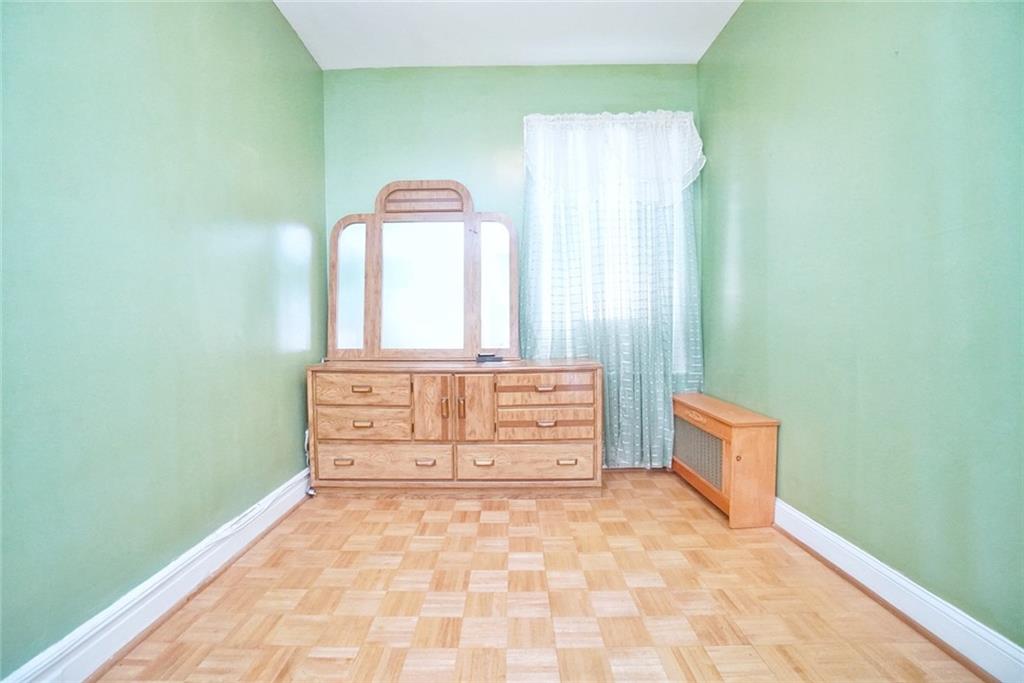 157 Sullivan Place Brooklyn, NY 11225 - Photo 5 of 28 a view of a bench in a room