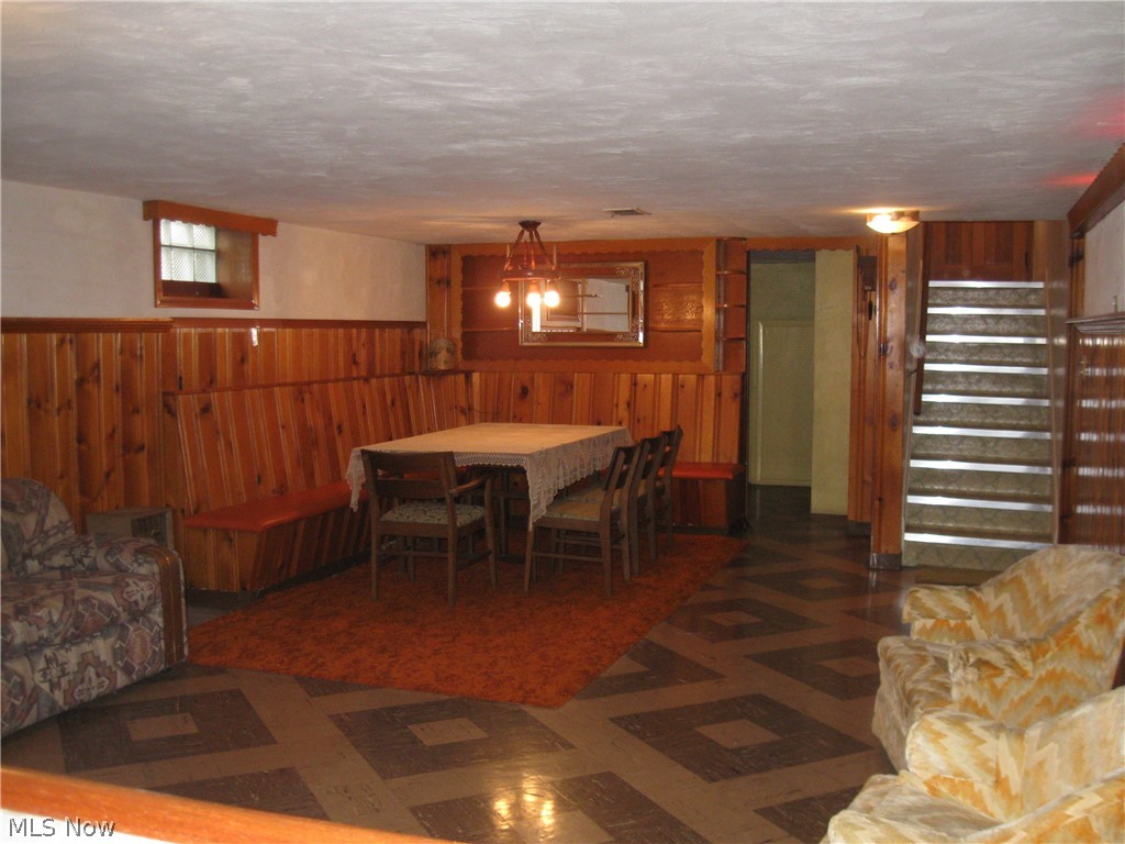 6154 State Road Parma, OH 44134 - Photo 13 of 35 Basement rec room looking toward dining area. Fruit cellar in far rear corner.