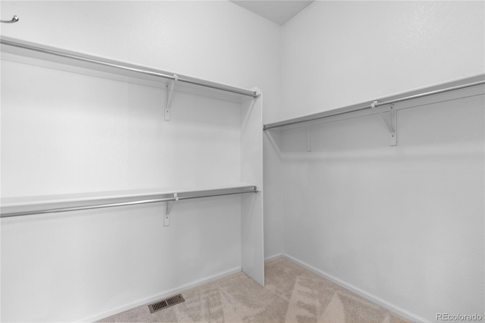8166 Wetherill Circle Castle Pines, CO 80108 - Photo 32 of 49 a view of an empty walk in closet