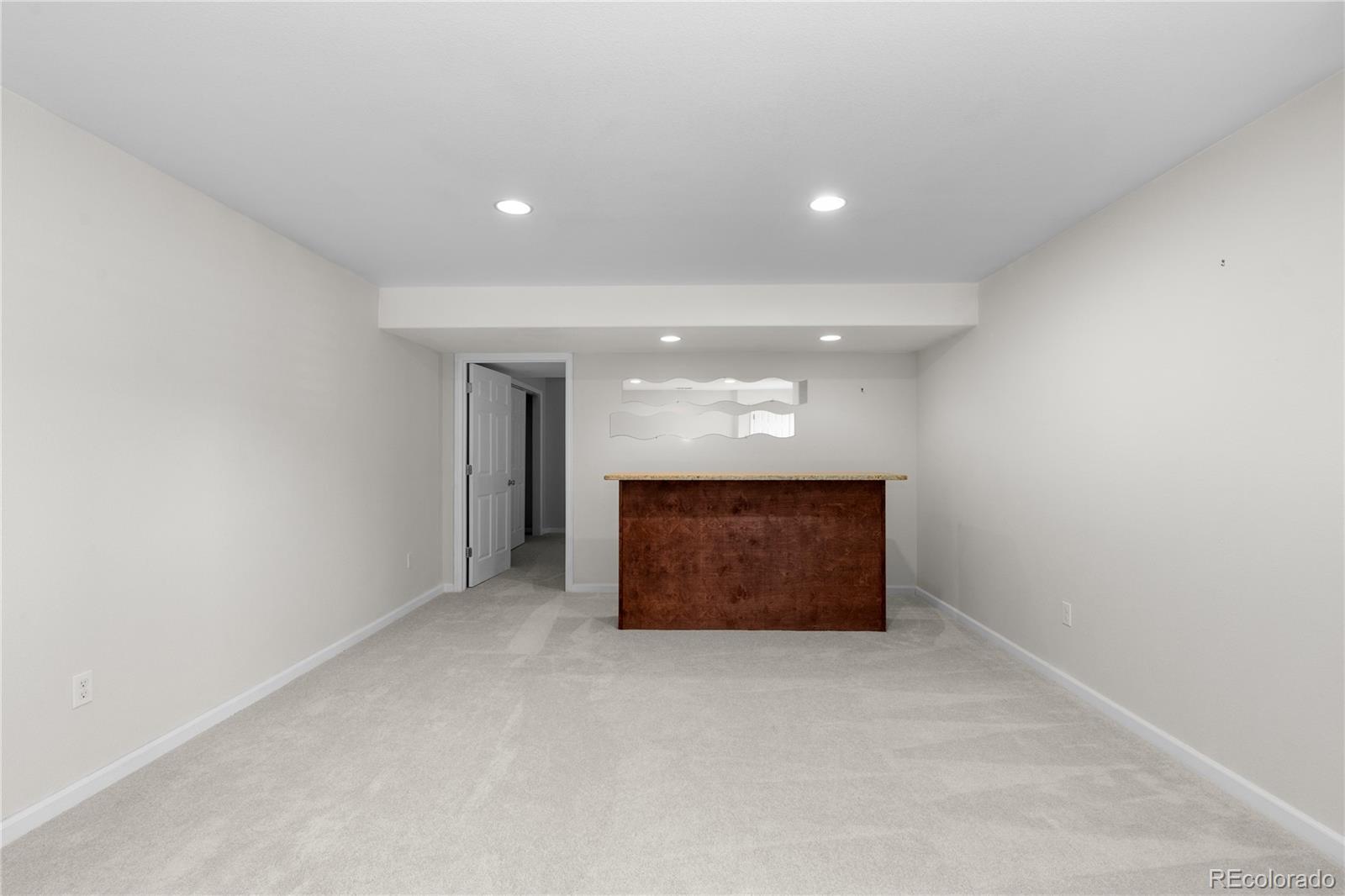 8166 Wetherill Circle Castle Pines, CO 80108 - Photo 35 of 49 a view of an empty room with a window