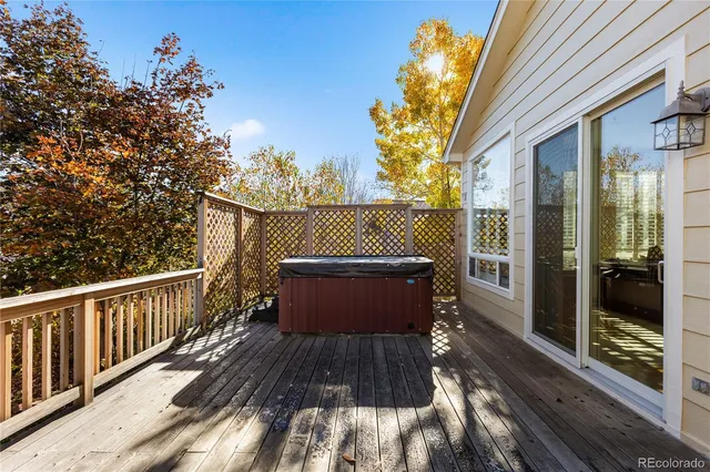 a view of balcony with wooden floor