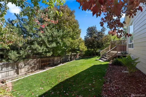a view of a backyard with a garden