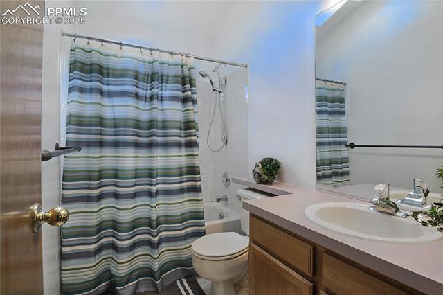2130 Wickes Road Colorado Springs, CO 80919 - Photo 24 of 49 Full bath with vanity and shower / bath combo
