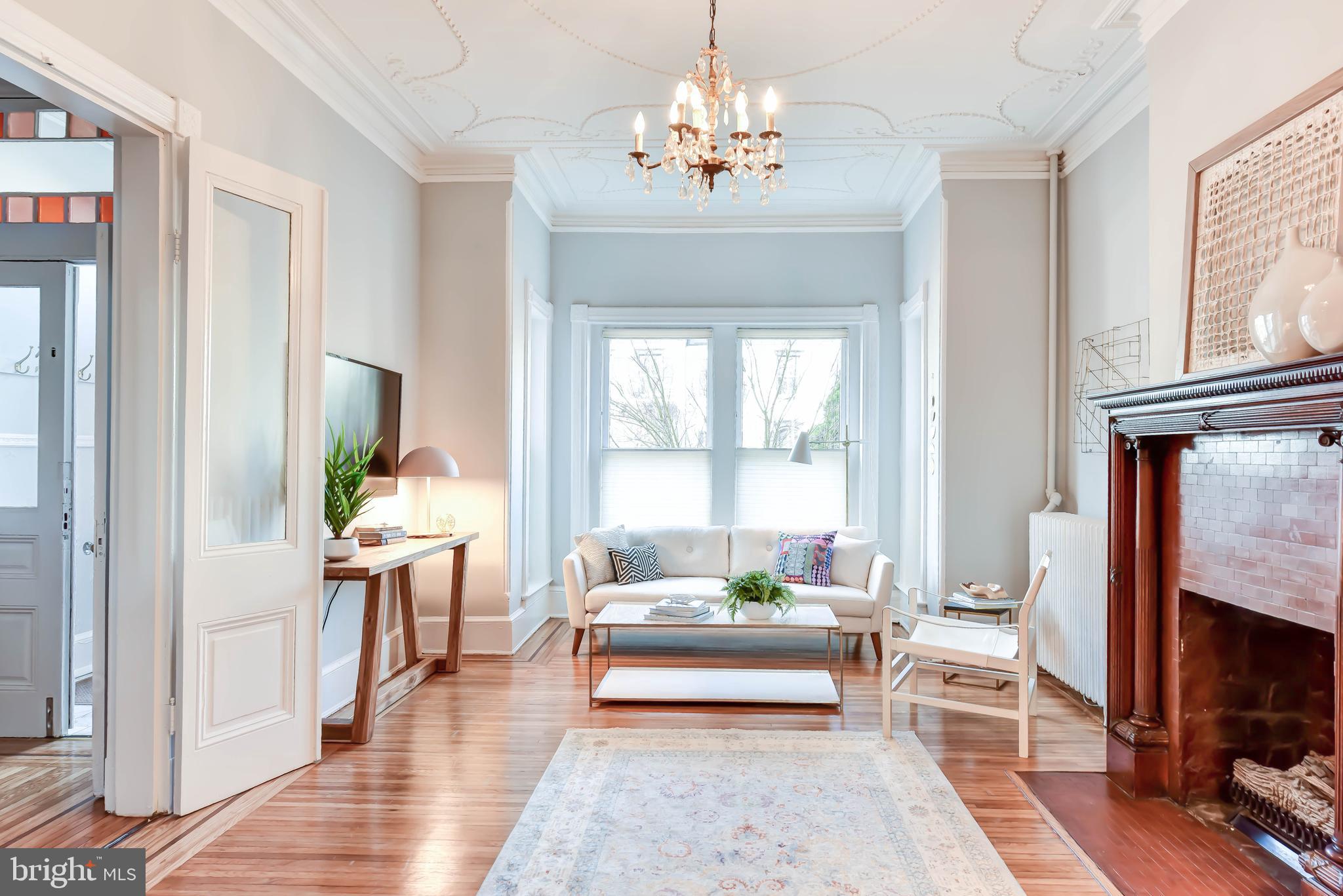 321 A Street Northeast Washington, DC 20002 - Photo 6 of 40 Note ornate plaster ceiling, stained glass transom