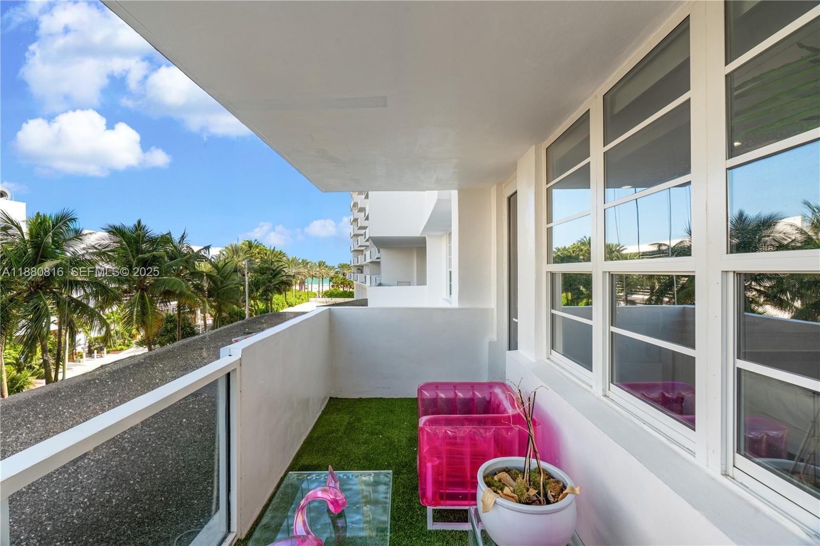 100 Lincoln Road, Unit 323 Miami Beach, FL 33139 - Photo 16 of 59 a room with toys and a potted plant