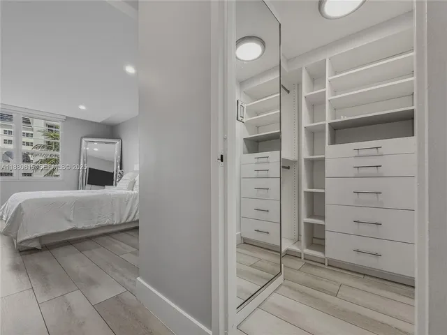 a view of a palm tree with an ocean view