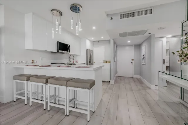 a bathroom with a toilet and a sink