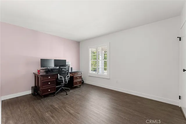 a room with furniture and flat screen tv