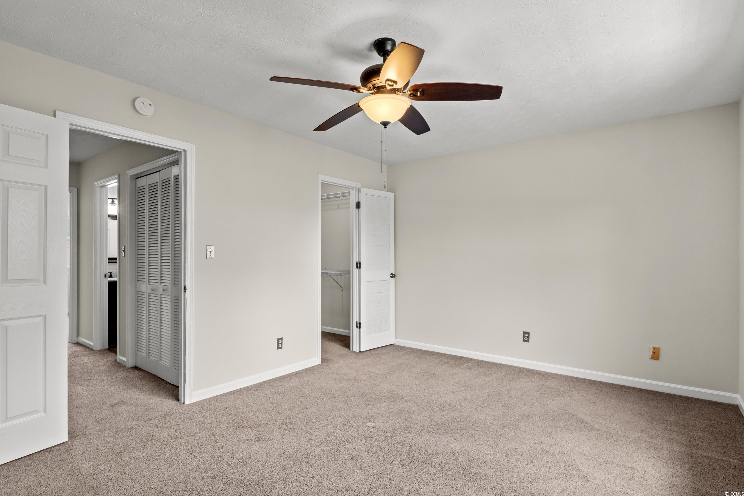 1025 Carolina Road, Unit S2 Conway, SC 29526 - Photo 12 of 27 Unfurnished bedroom featuring carpet floors and ce
