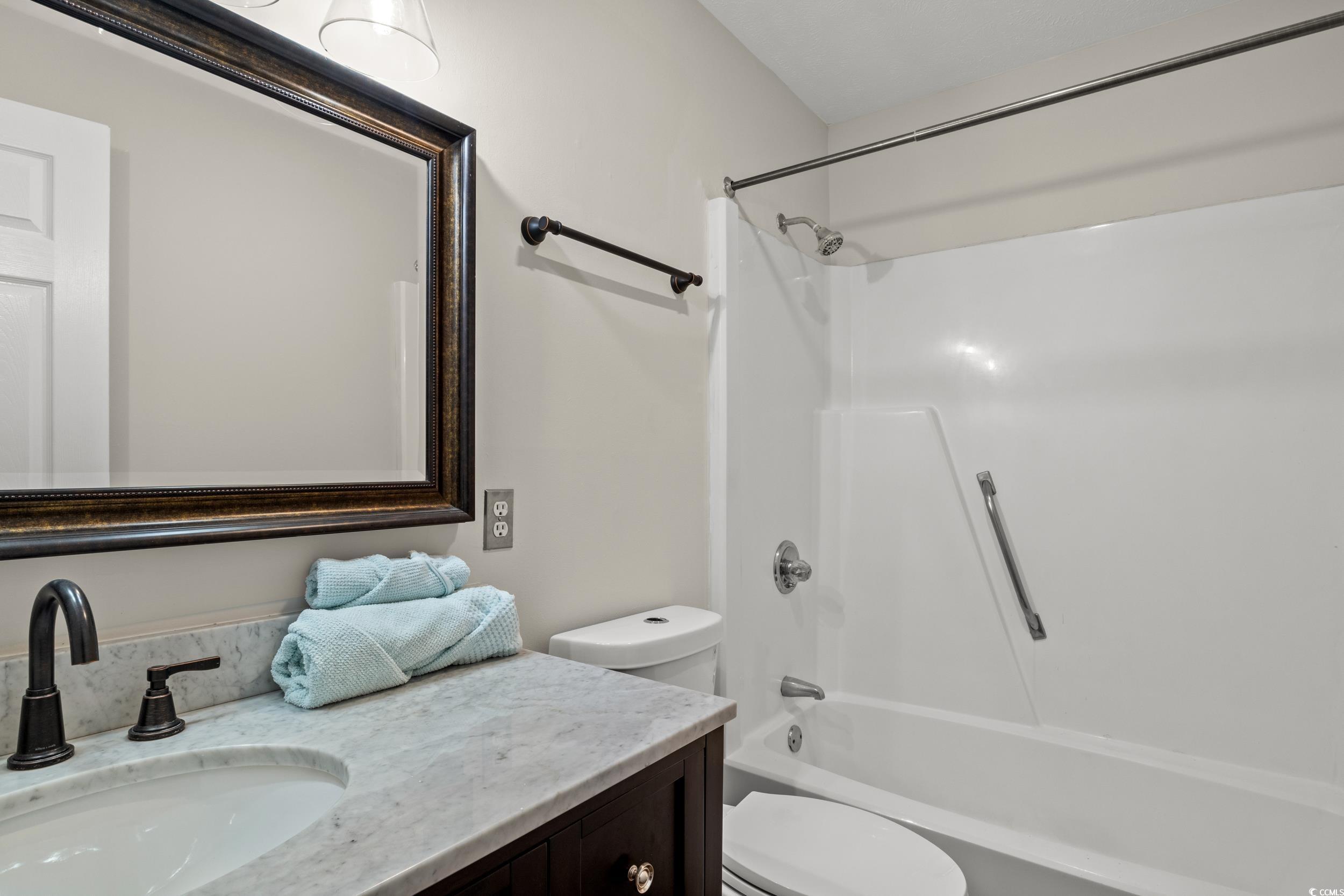 1025 Carolina Road, Unit S2 Conway, SC 29526 - Photo 19 of 27 Full bathroom featuring shower combination, toile