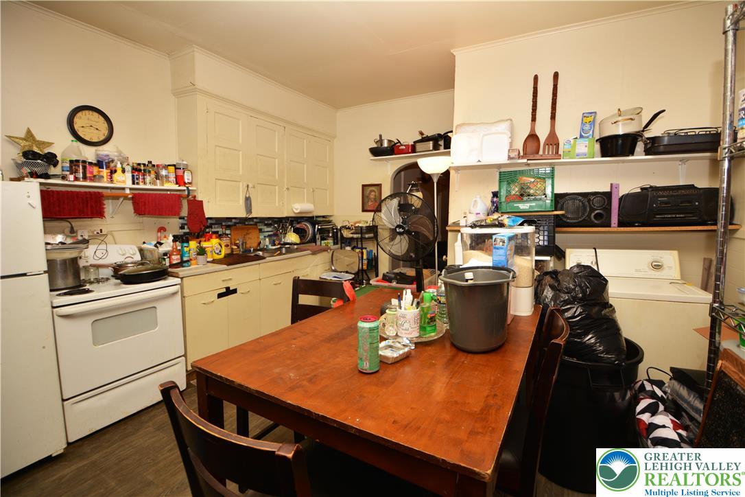 745 Main Street Kingston, PA 18704 - Photo 11 of 15 a kitchen with a sink and cabinets