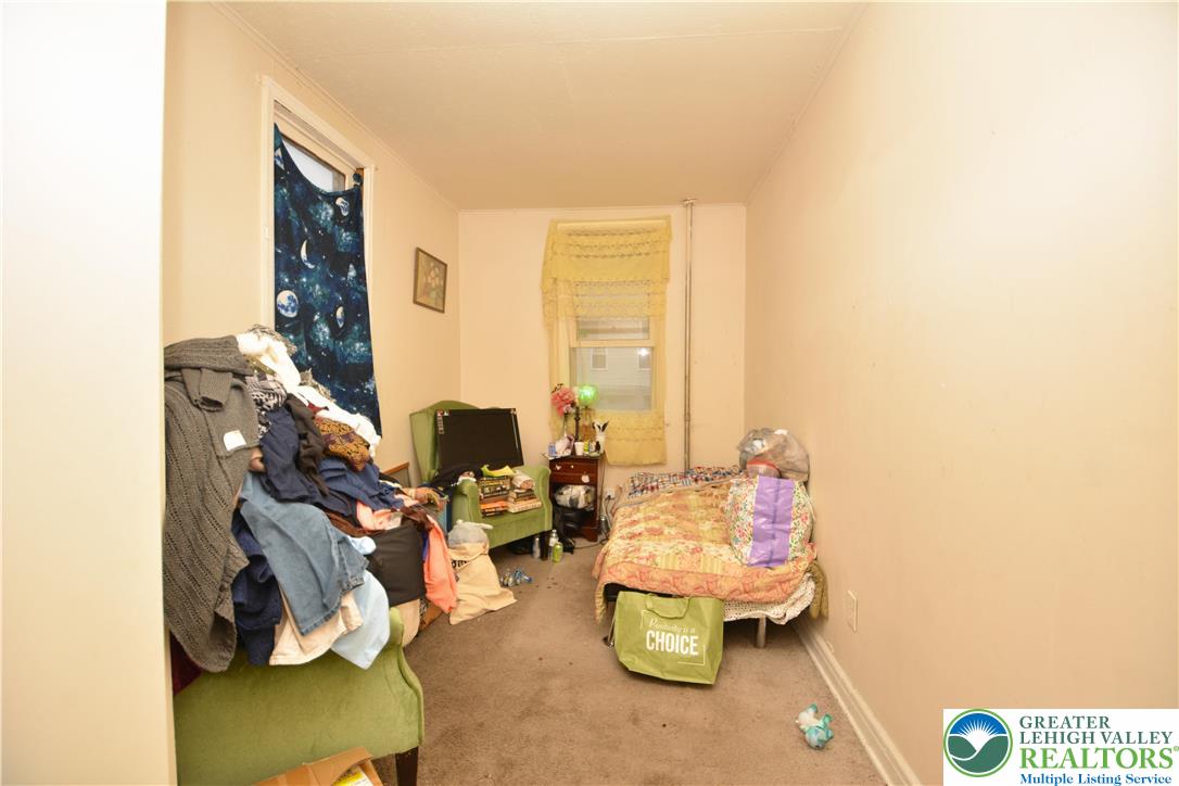 745 Main Street Kingston, PA 18704 - Photo 15 of 15 a living room with furniture and a window