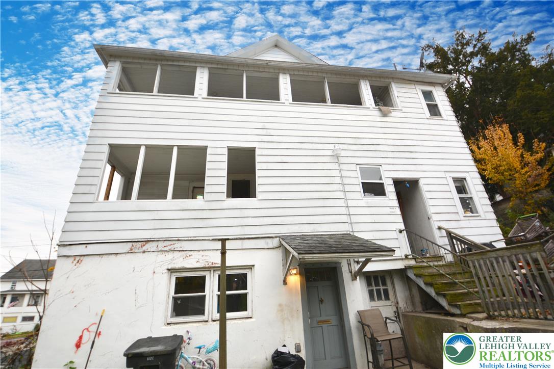 745 Main Street Kingston, PA 18704 - Photo 2 of 15 a house that has a window in front of it