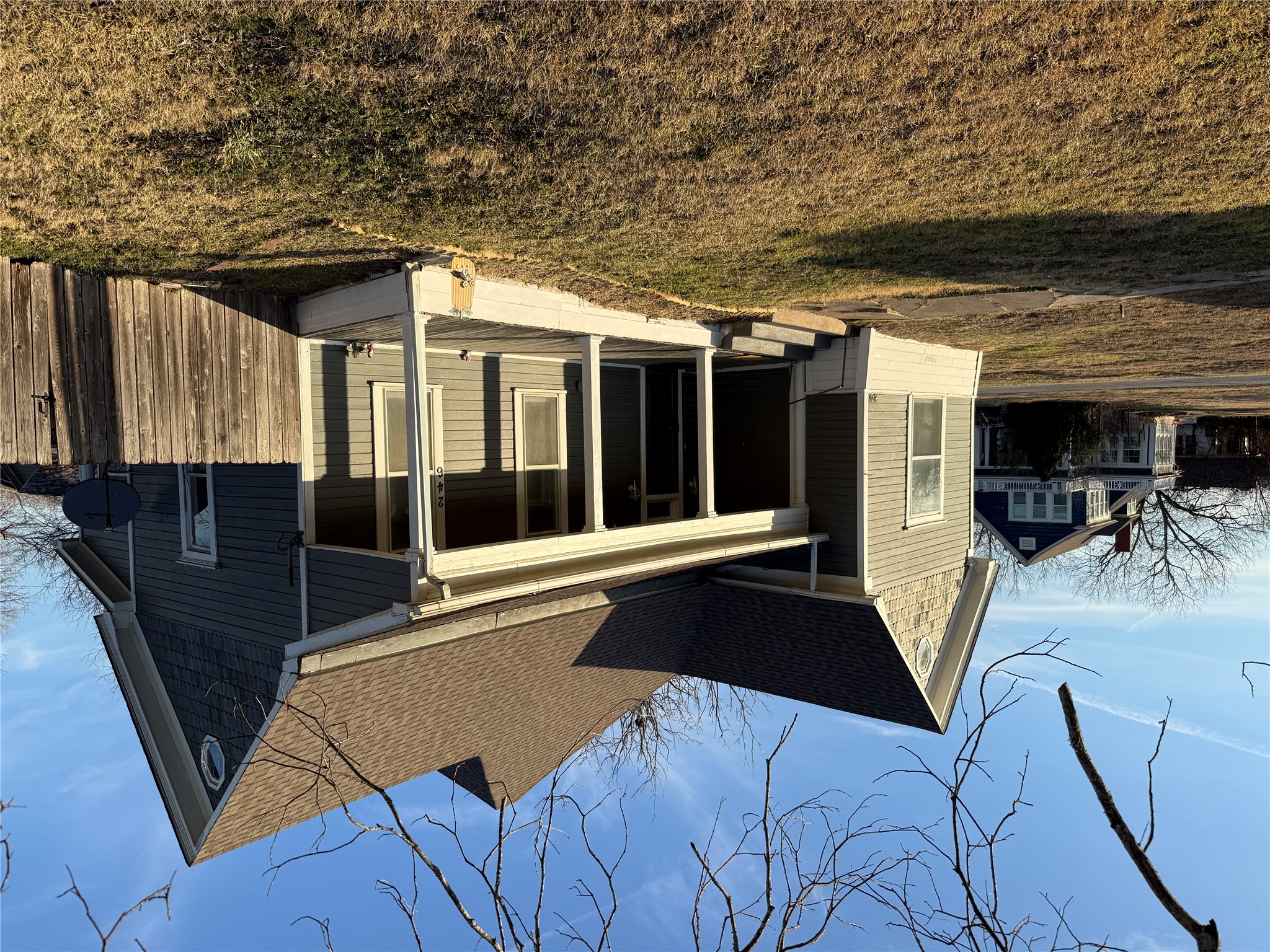 246 West Clark Street Bartlett, TX 76511 - Photo 2 of 16 a front view of a house with a garden
