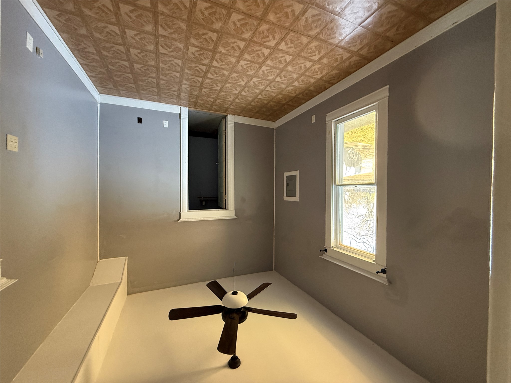 246 West Clark Street Bartlett, TX 76511 - Photo 10 of 16 a view of empty room with window and ceiling fan