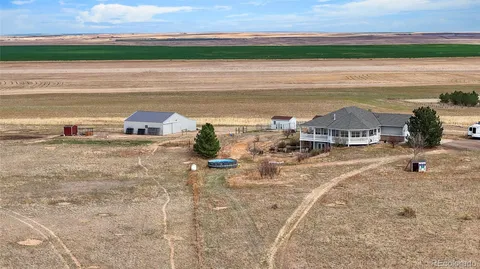 $925,000 | 57443 East Geddes Avenue, Strasburg, CO 80136