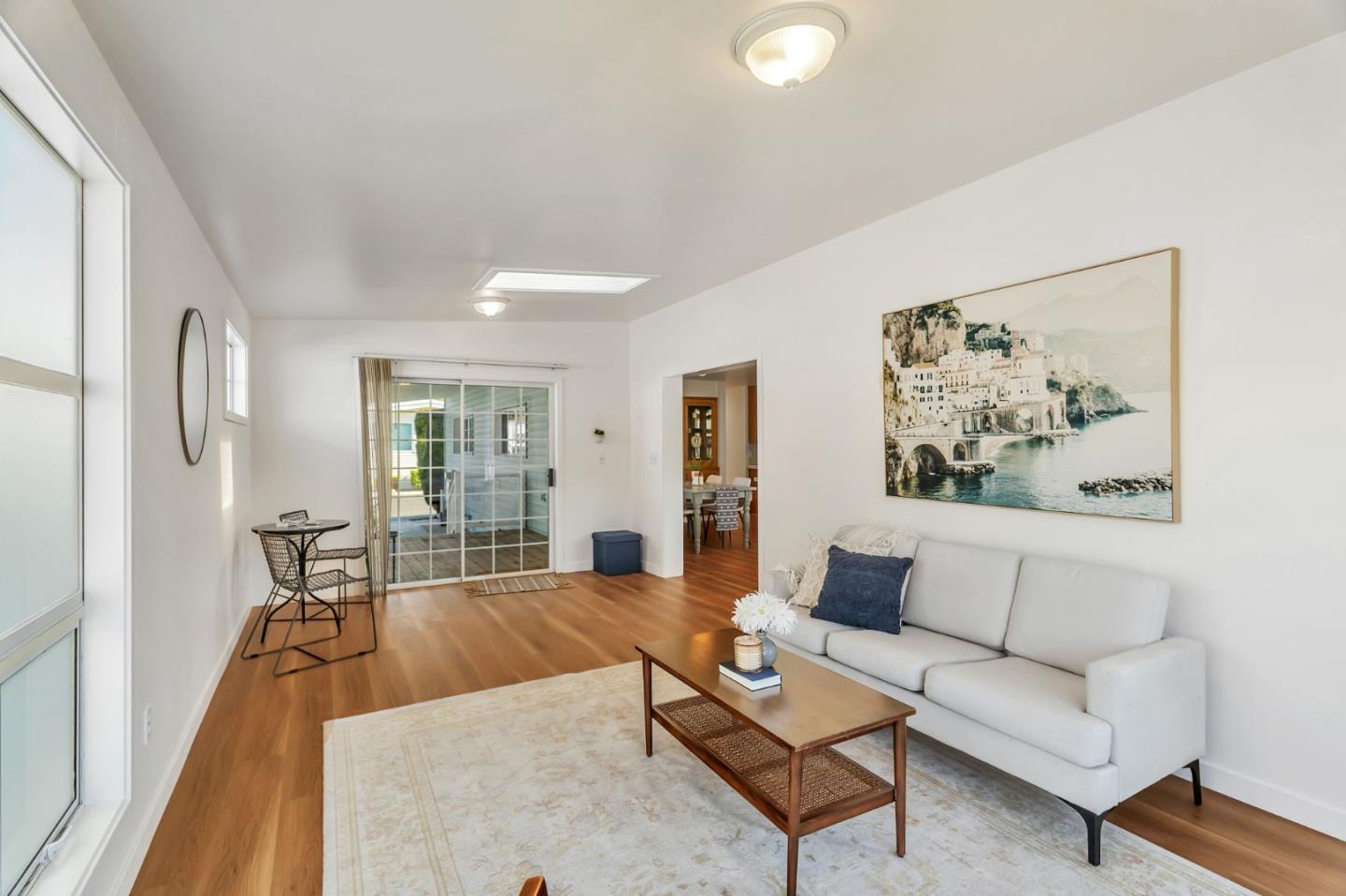 225 Mt Hermon Road, Unit 81 Scotts Valley, CA 95066 - Photo 6 of 38 a living room with furniture and wooden floor