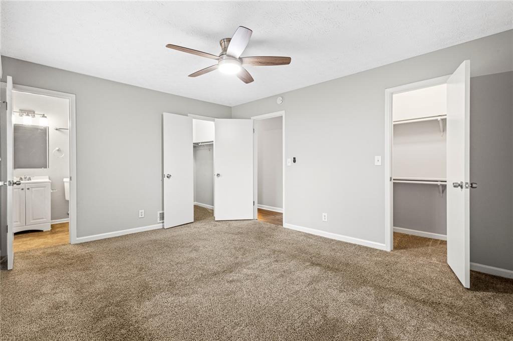 1735 Charmeth Road Lithonia, GA 30058 - Photo 19 of 27 a view of an empty room with a bathroom