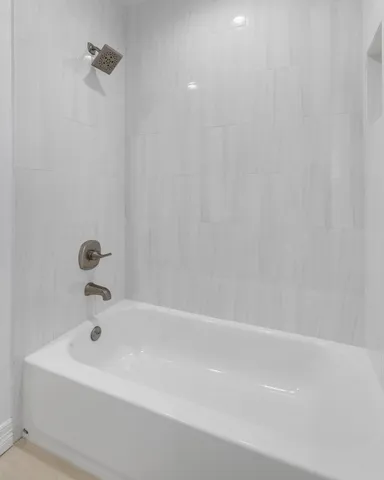 a bathroom with a bathtub