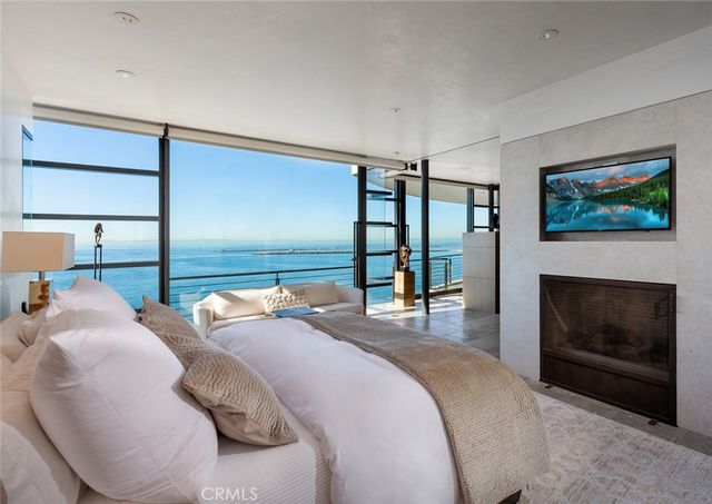 a bedroom with furniture and window