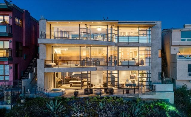 a view of a living room and balcony