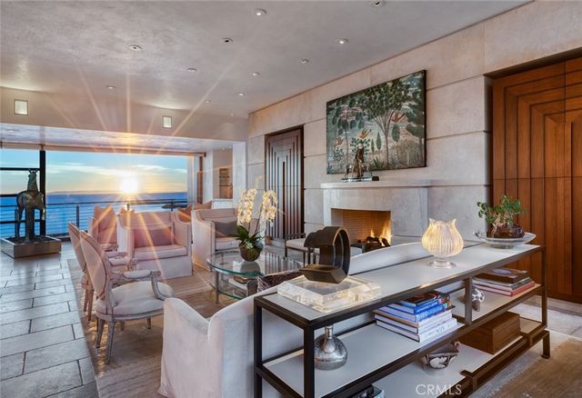 a dining room with furniture a rug and wooden floor