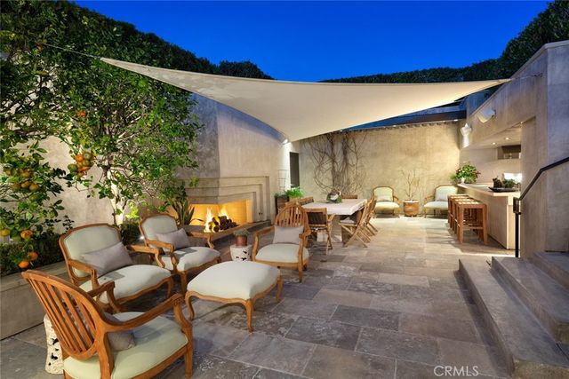 an aerial view of houses with trees