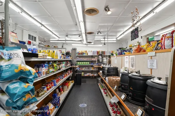 a room with lots of different kinds of flowers