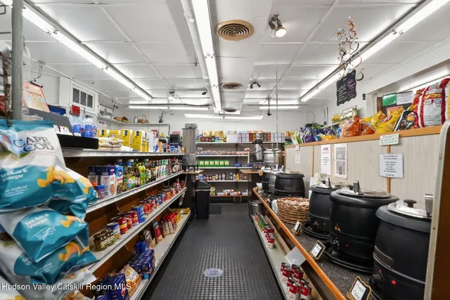 a room with lots of different kinds of flowers