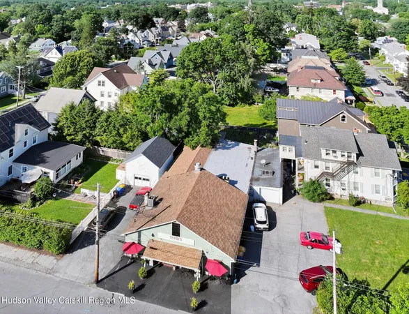 an aerial view of a and white house