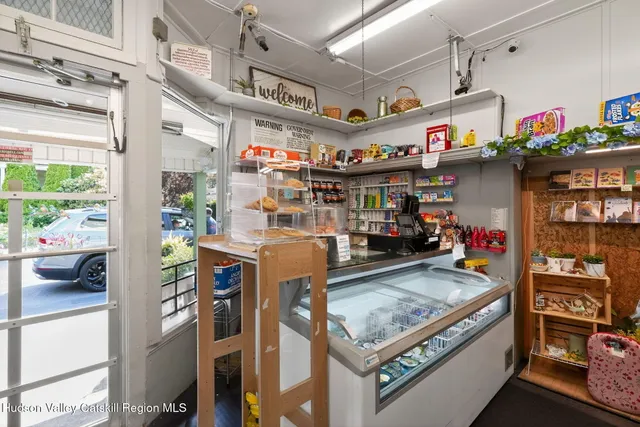 a utility room with lots of wooden furniture