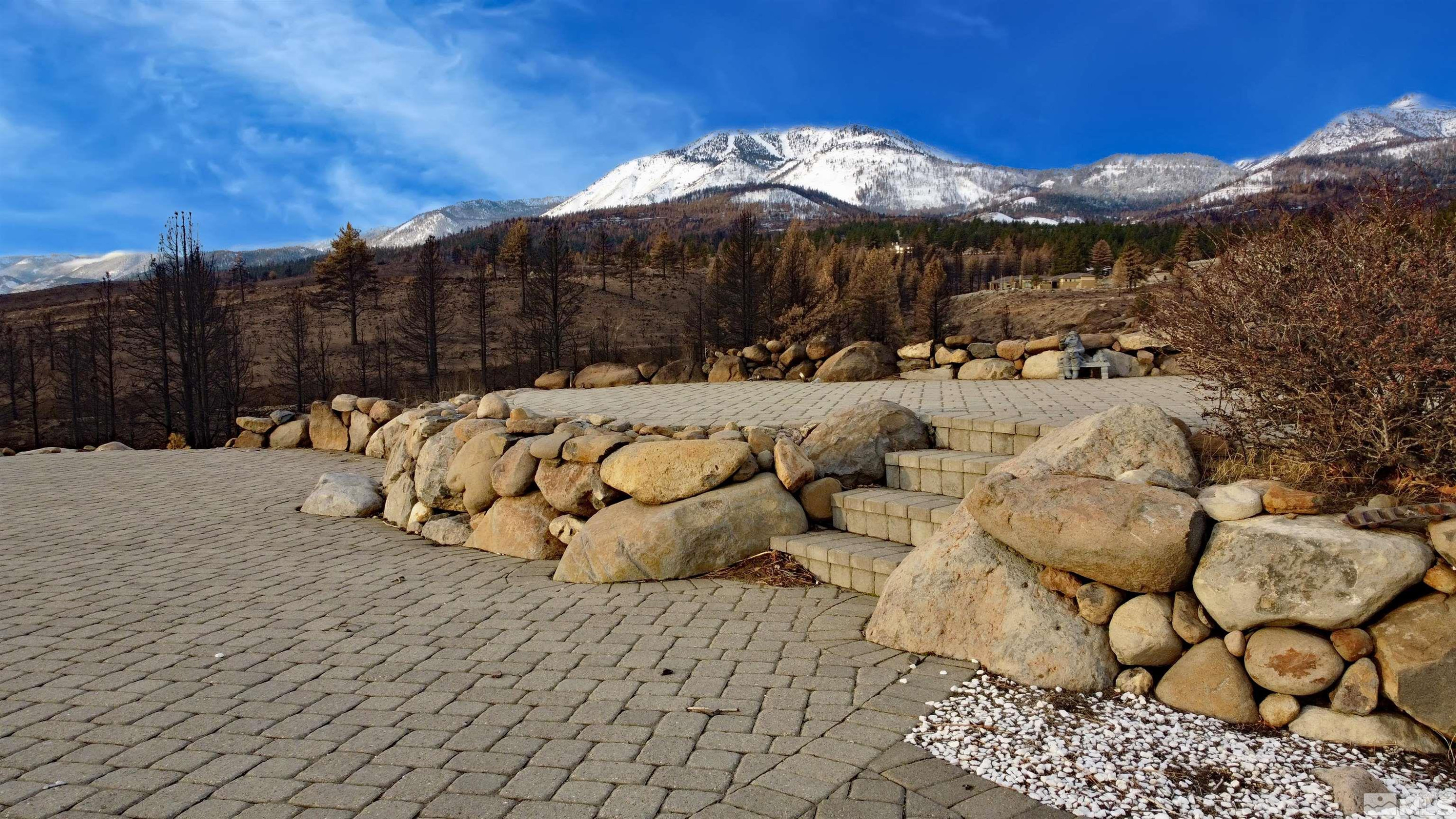 a view of a backyard of the house