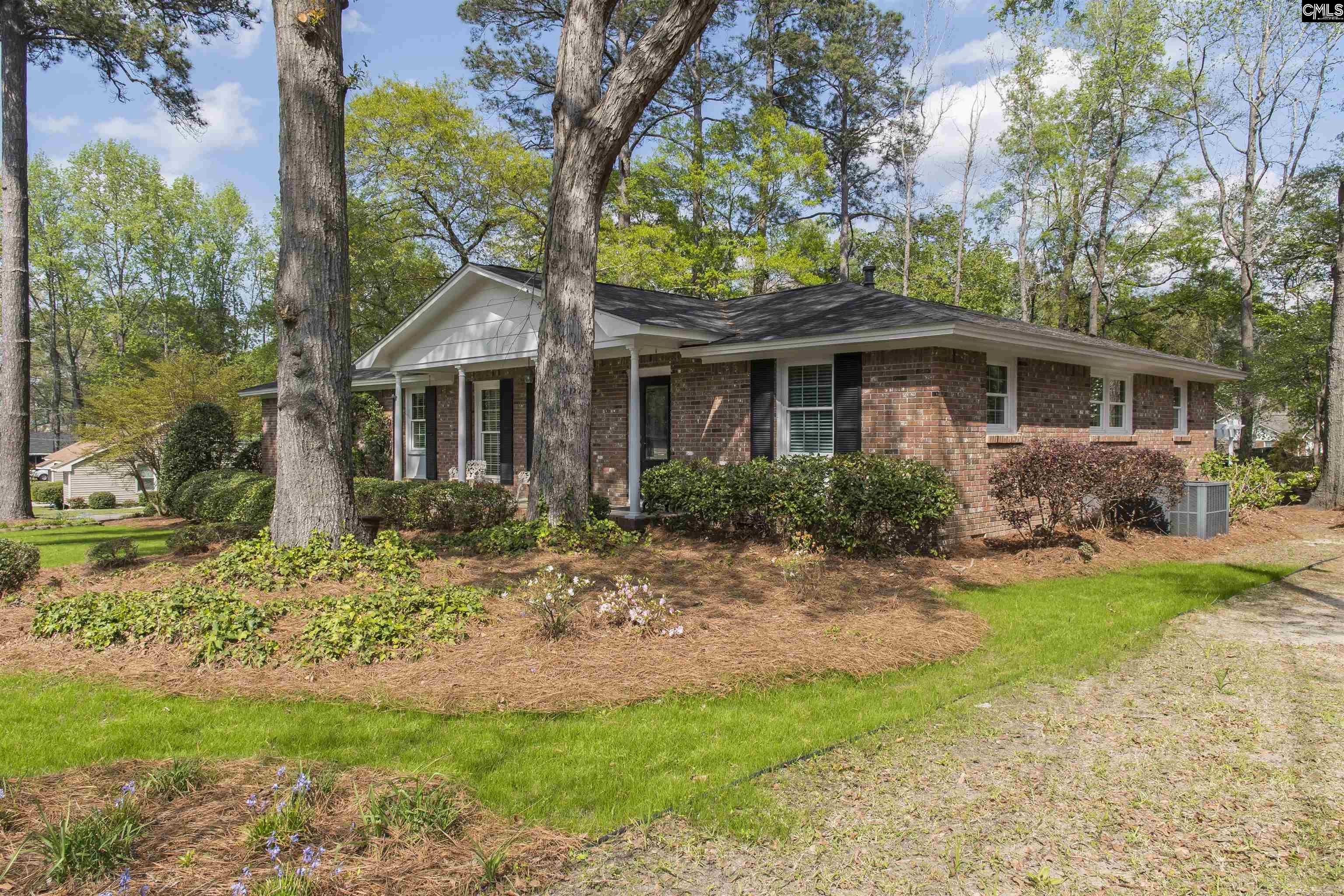 2309 Cunningham Road Columbia, SC 29210 - Photo 3 of 41 a front view of a house with a garden