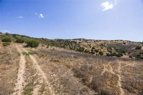 a view of ocean and mountain