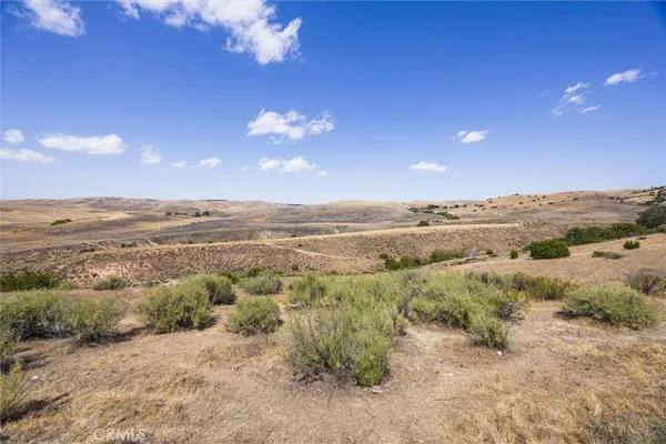 a view of a snow on the road