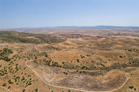 an aerial view of beach and city