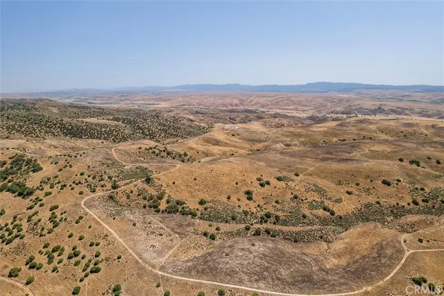 an aerial view of beach and city