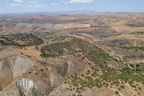 an aerial view of residential house with outdoor space