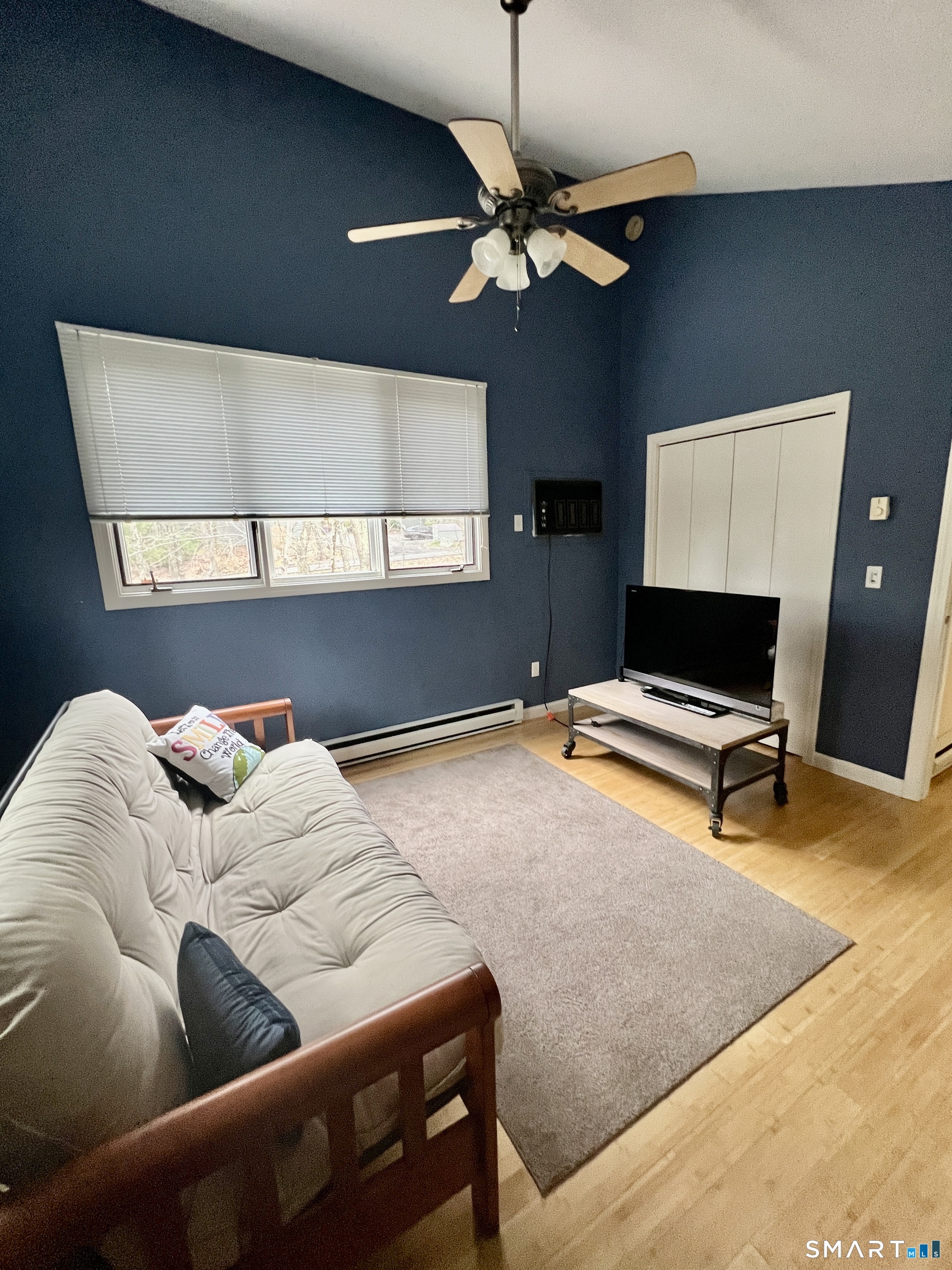 305 Cliffside Drive Torrington, CT 06790 - Photo 15 of 25 a living room with furniture and a flat screen tv