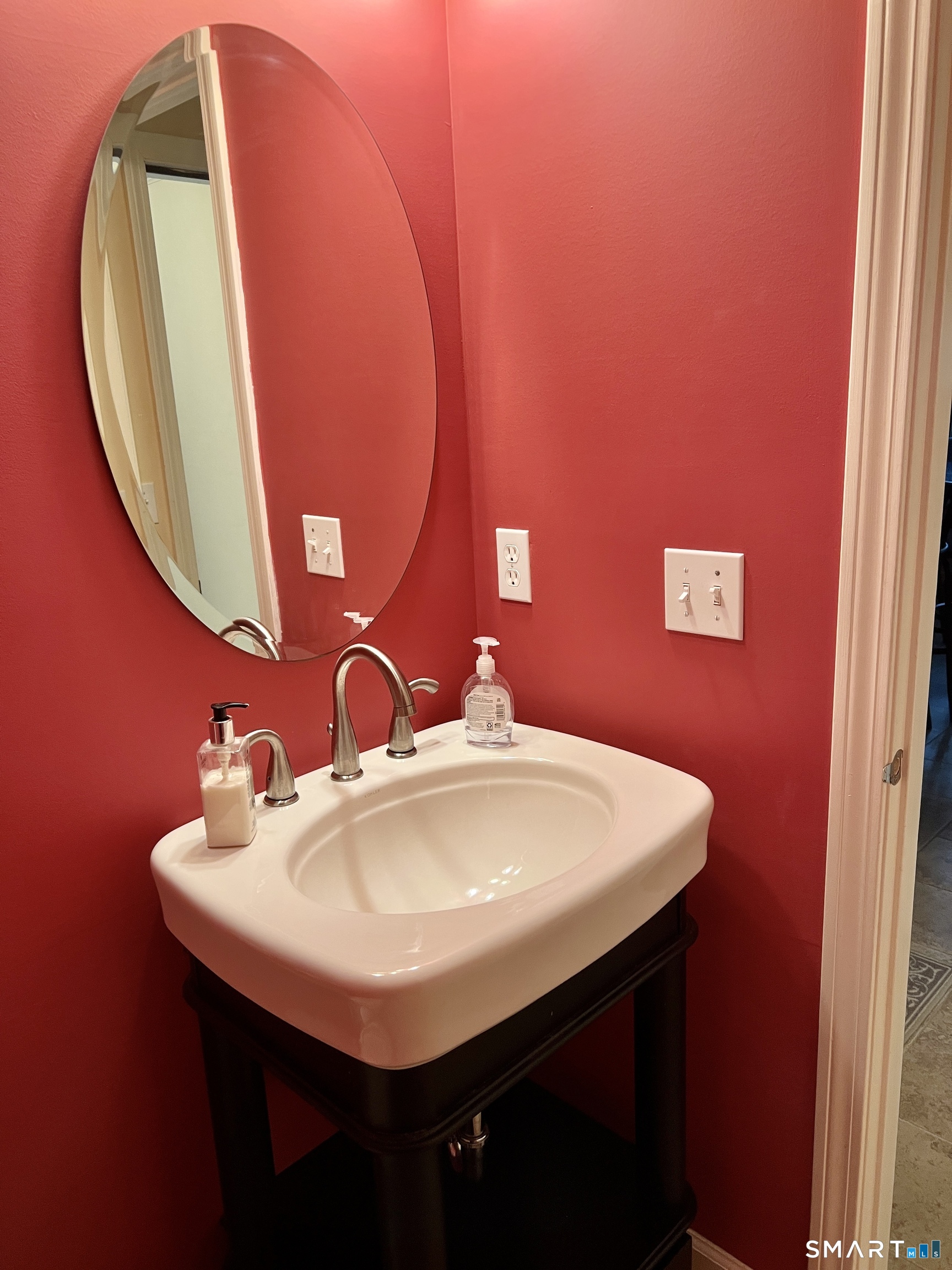 305 Cliffside Drive Torrington, CT 06790 - Photo 21 of 25 a sink with a mirror
