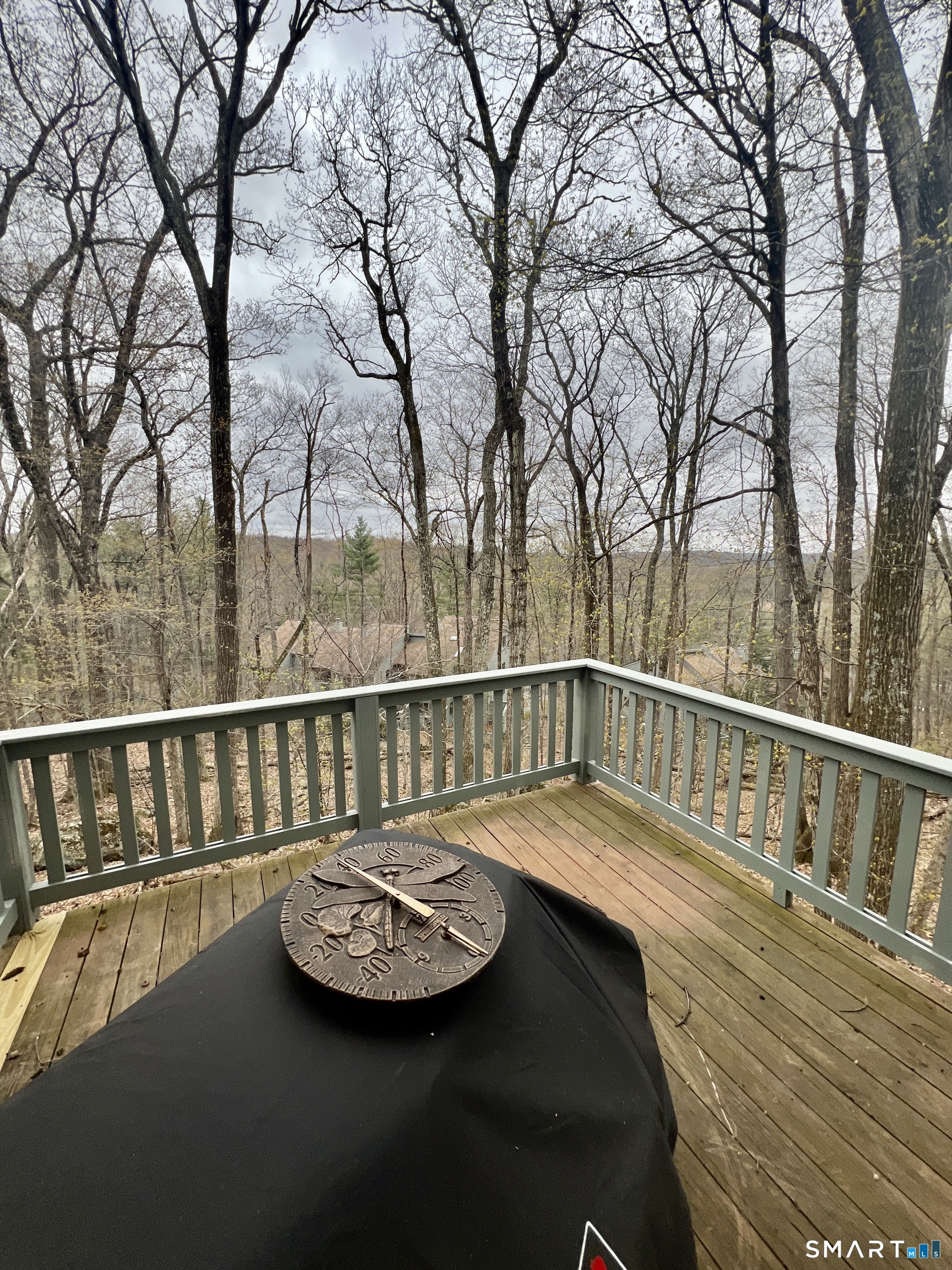 305 Cliffside Drive Torrington, CT 06790 - Photo 24 of 25 a view of balcony with wooden floor and fence